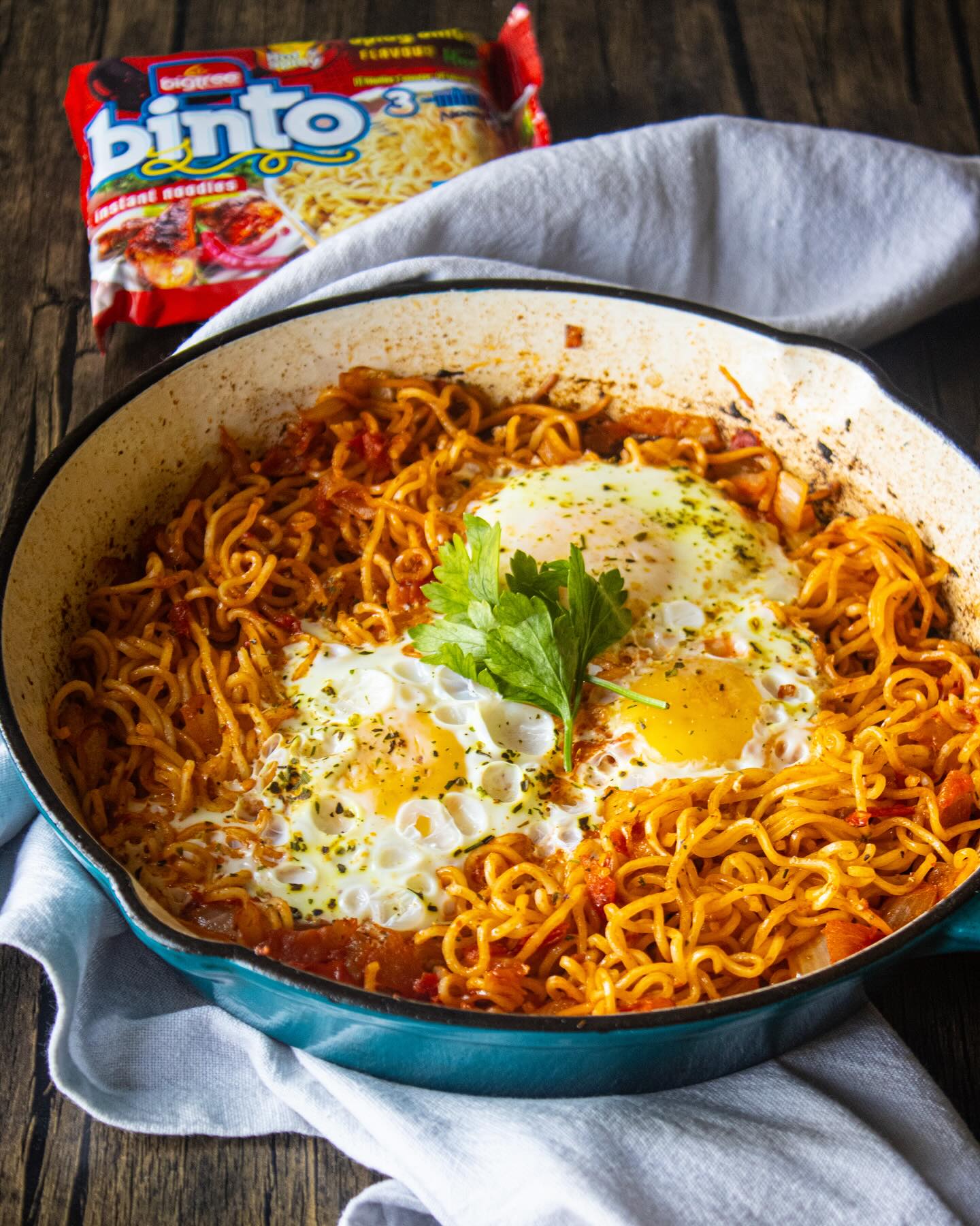 Binto Spicy noodles styled with fried eggs for BigTree Brands