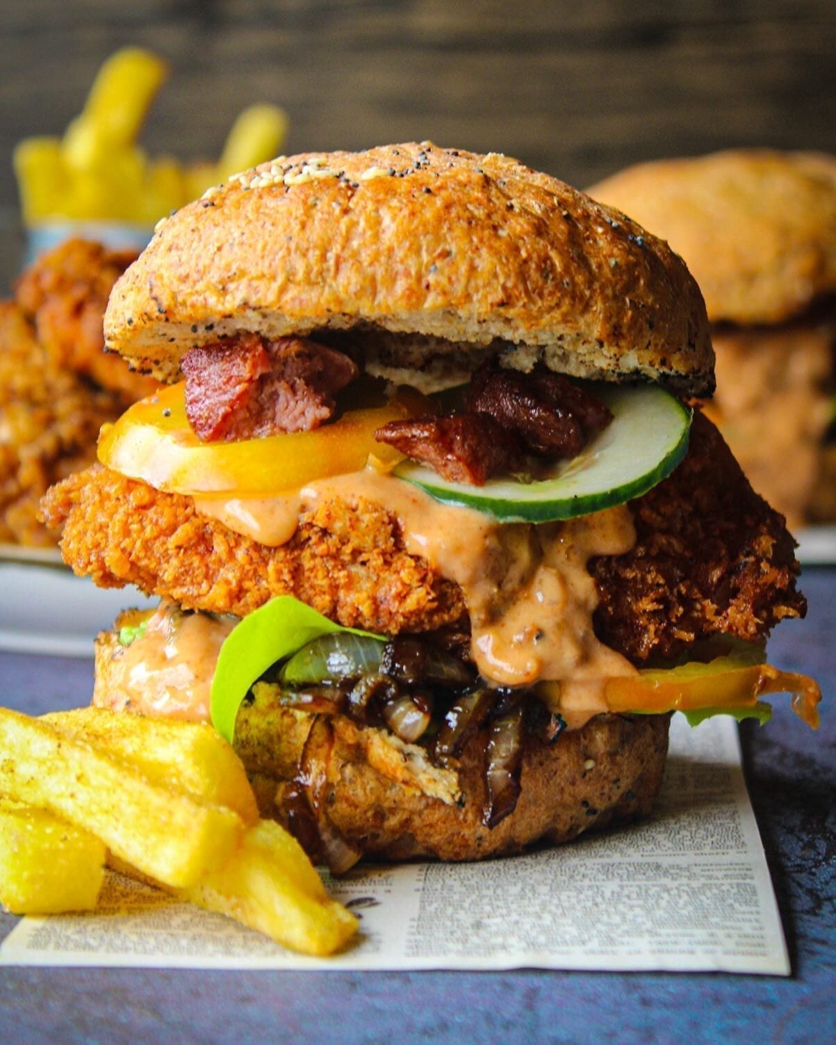 Detail shot of a fried chicken burger and fries for Country Choice Chicken