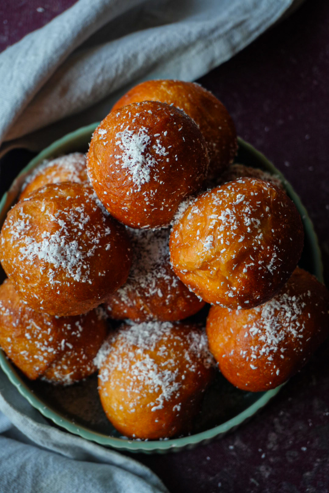 Overhead shot of coconut-dusted doughnuts styled for National Milling Corporation