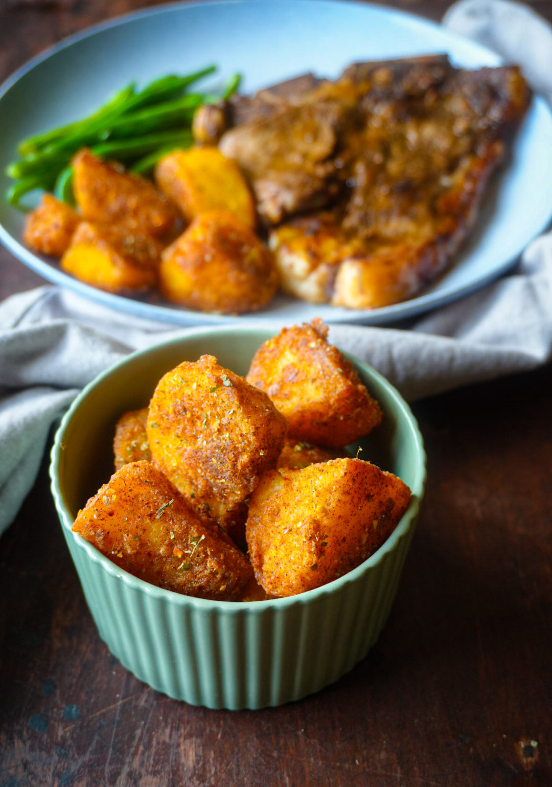 Detail shot of Rhodes Quality seasoned roasted potatoes styled for Rhodes Food Group